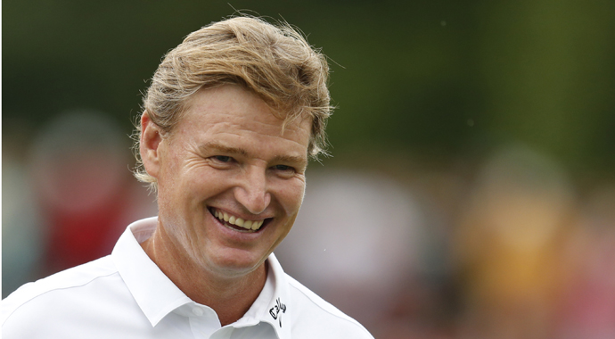 Ernie Els of South Africa laughs after winning the final round at the BMW International Golf Open at Golfclub Eichenried near Munich, southern Germany, Sunday, June 23, 2013. (AP Photo/Matthias Schrader)